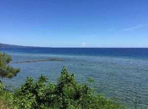 An azure sky meets the blue ocean